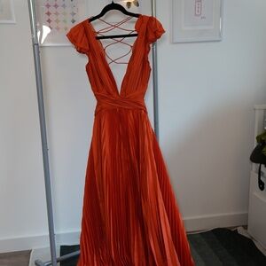 MAC DUGGAL PLEATED FLUTTER-SLEEVE DEEP-V LACE-UP GOWN